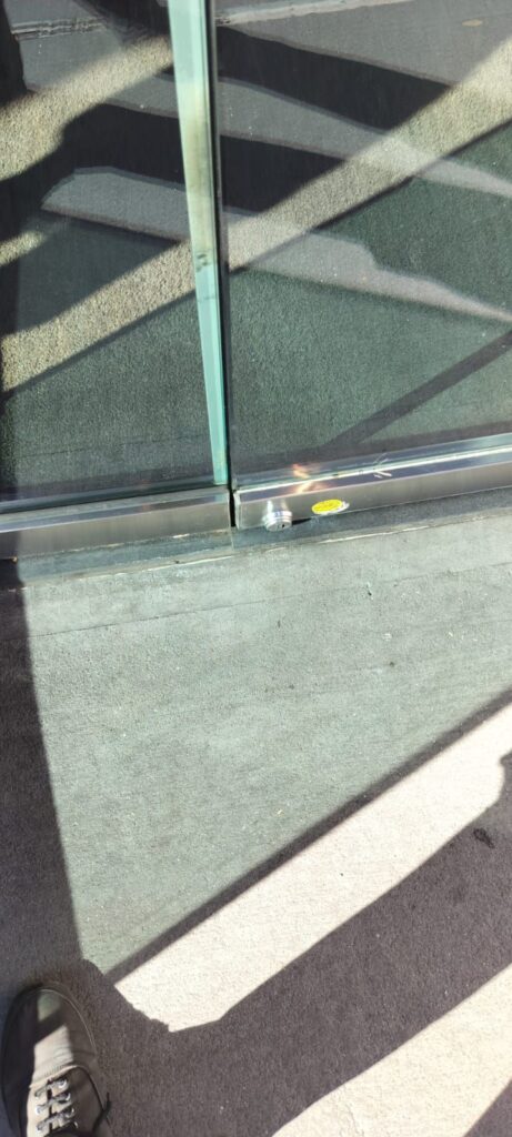 Glass  Storefront  Door  Slamming  in  Manhattan    Midtown  Floor  Check  Adjustment  West  50th  Street b