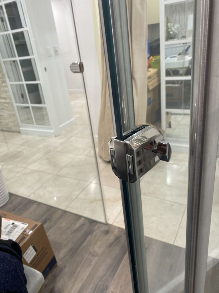 Midtown Glass Door Not Closing Properly east 48th and madison ave A